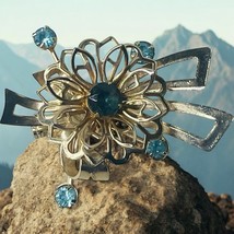 Vtg MCM Silvertone Blue Rhinestone Stylized Brooch Pin - $15.87
