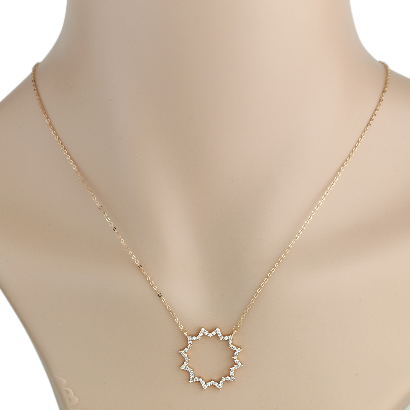 rose gold tone sun burst pendant necklace with swarovski style crystals