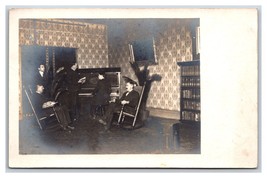 RPPC Men in Parlor Gathered Around Piano Rocking Chairs UNP Postcard S3 - £3.84 GBP