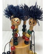 Wooden dancing push puppet multi colored bead body people yarn hair Rasta - £11.09 GBP