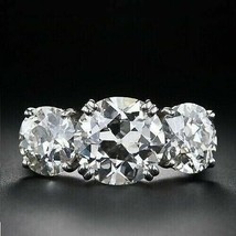 Anillo de compromiso de tres diamantes simulados de corte redondo de 4,5... - £205.44 GBP