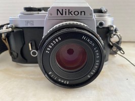 Nikon FG 35mm SLR Film Camera w/50 1.8 Lens Bag Filters Strap Japan EUC Untested - $99.00