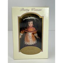 Pretty Woman Porcelain Doll Ornament Rust Orange Lace Dress Brunette 200... - $165.53 MXN Pretty Woman Porcelain Doll Ornament Rust Orange Lace Dress Brunette 200... - $165.53 MXN
