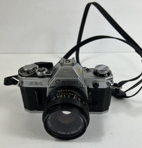 Vintage Canon AE-1 35mm SLR Film Camera with Canon 50mm f/1.8 FD Lens Untested - £116.89 GBP