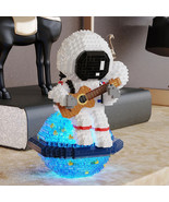 1423pcs Guitar Astronaut Model Luminous Assembled Educational Block Toys... - £15.71 GBP