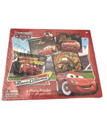The World Of Cars Race O&#39;Rama 4 Photo Puzzles 9”x 11” Retired Lightning ... - $18.80