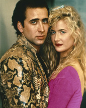 An item in the Entertainment Memorabilia category: Wild at Heart Laura Dern Nicolas Cage in snakeskin jacket 8x10 Photo