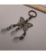 Green, purple, bronze tone butterfly keychain - $167.85 MXN
