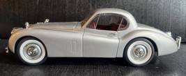 SIGNATURE DIECAST 1949 JAGUAR XK120 HARD TOP 1:18 SCALE SILVER RED INTERIOR - $14.61