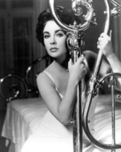 Elizabeth Taylor holds onto brass bed The Long Hot Summer 24x36 inch poster - £22.56 GBP