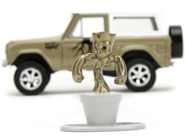 1973 Ford Bronco Gold Metallic with White Top and Groot Diecast Figure "Guardian - $50.49