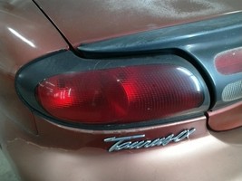 Driver Tail Light Sedan Quarter Panel Mounted Fits 98-99 TAURUS 104865125 - $74.75