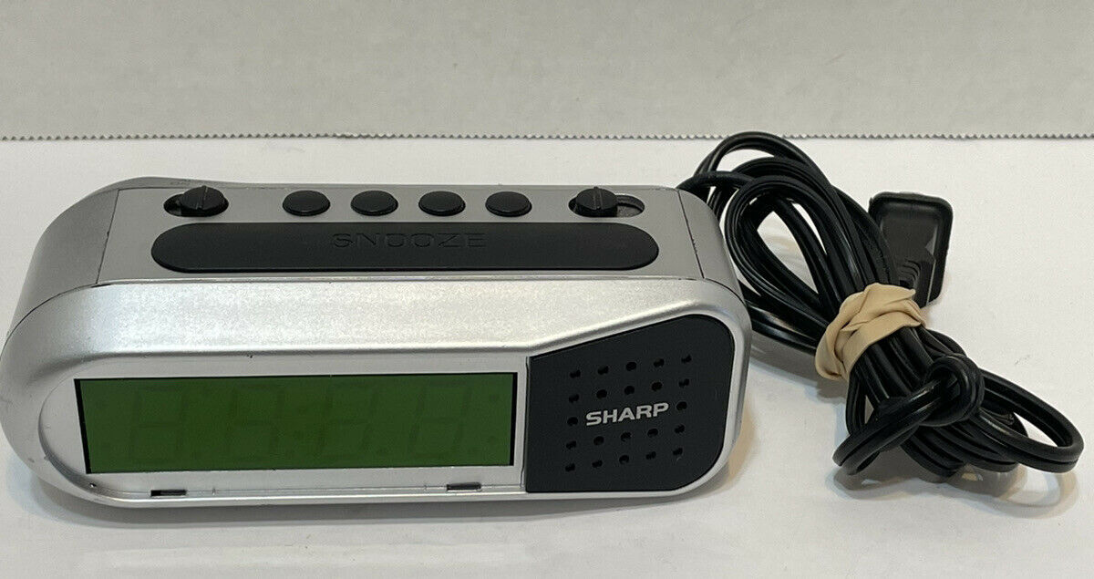 Sharp SPC100 Dual Alarm Clock LCD Screen Battery Back Up Tested Working 5.5 x 2" - $8.68