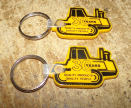 2-lot aurora,il. CAT tractor 30 years keyrings new - $19.79