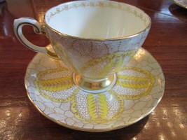 Tuscan Compatible with England fine china tea cup/saucer, yellow and gol... - $46.05