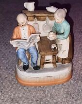 VTG Music Box Ceramic Grandma &amp; Grendpa At The Hearth Reading Paper Tea - $17.99