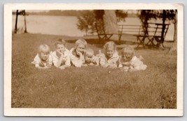 RPPC Edwardian Children Laying In Grass Swift Lard Tin Pail c1908 Postcard G36 - $9.95