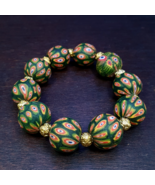 Bracciale vintage antico stile Gabri verde africano con perle a cento occhi - $1,171.78 MXN