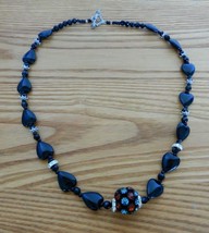 Vtg black plastic beaded princess length necklace w/ rhinestone ball ctr - $12.00