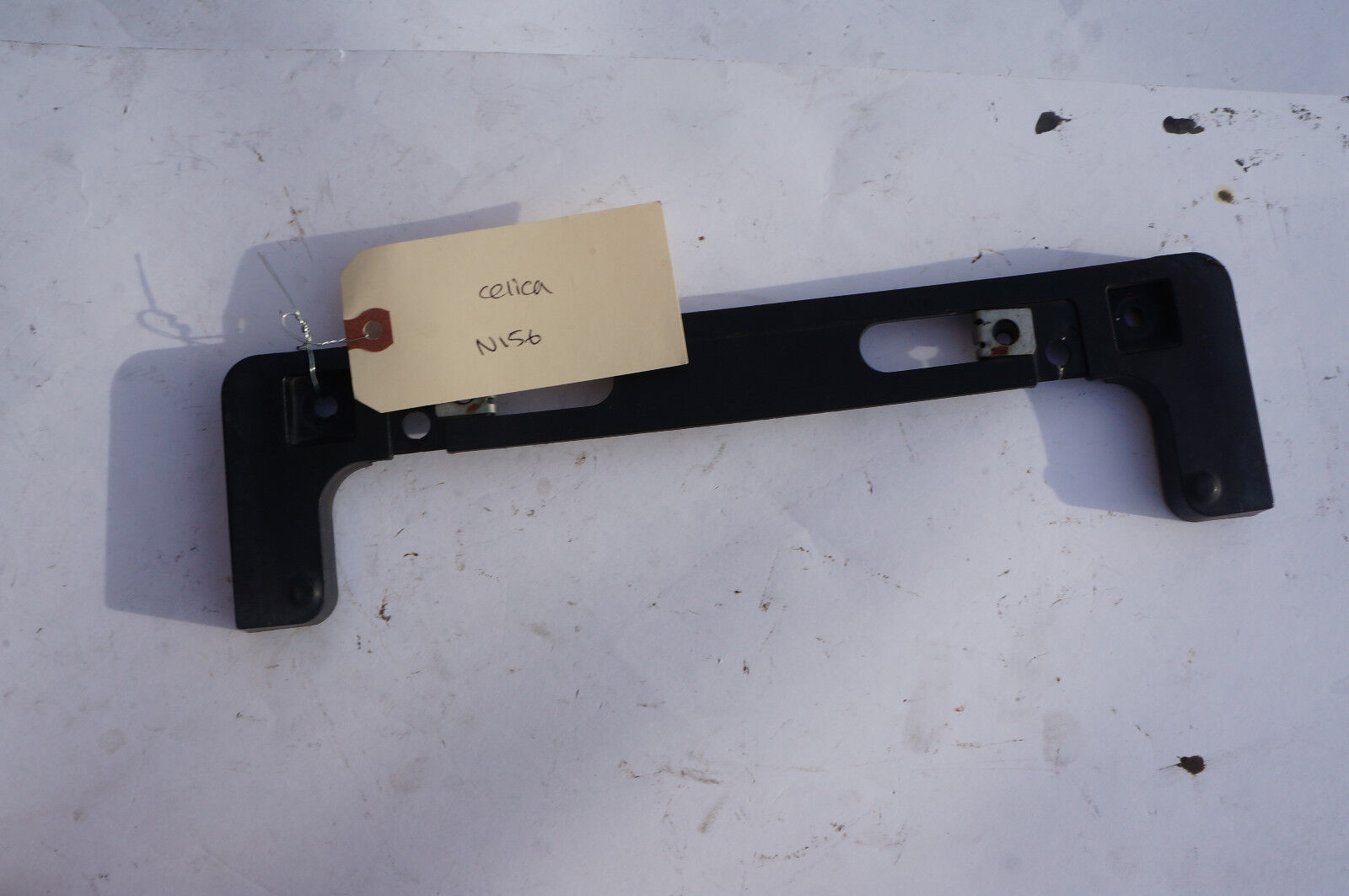 00-05 CELICA GT GTS FRONT BUMPER LICENSE PLATE BASE BRACKET N156 - $38.69
