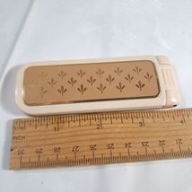 Vintage Avon Lint Brush remover for clothes Travel Folding 1982 cream go... - $14.00