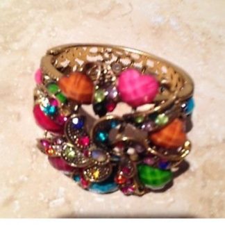 multicolored cuff bracelet easy to get on and off front closure - $24.99