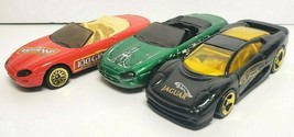 3 Hot Wheels Jaguar Diecast Vehicles: Black XJ220, Green XK-8, Red XK-8 - $5.47 CAD