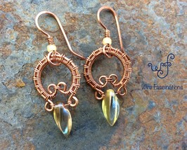 Handmade copper earrings: woven hoops with amber glass twisted dagger beads - £28.06 GBP