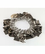 Authenticity Guarantee

Sterling Silver American West Charm Bracelet w/ ... - $2,017.33 CAD