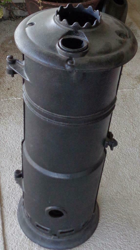 Antique J B Clow & Sons water heater stand ornimental cast iron garden  accent