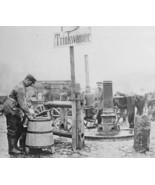 German soldier refilling water canteens Lodz Poland 1914 World War I 8x1... - £6.87 GBP