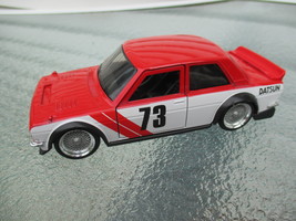 Jada, 1973 Datsun 510, Red/White, 1:32 Die-cast, widebody?  - $266.51 MXN