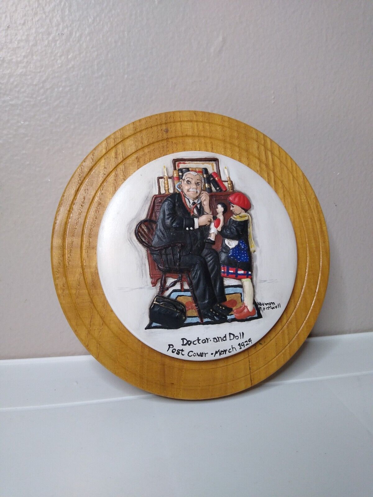 Vintage Doctor And Doll Norman Rockwell Ceramic And Wood Round Wall Decor - $39.99
