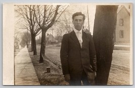 RPPC Handsome Young Man On Residential Street Sidewalk Real Photo Postcard H30 - £5.43 GBP