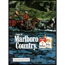 1983 Marlboro Cigarettes Vintage Print Ad Man Cowboy Horses Crossing River Photo - $10.97