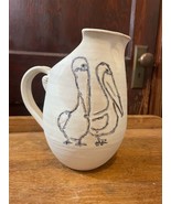 Pottery Pitcher with a Etched Blue Pelicans Signed - £23.25 GBP