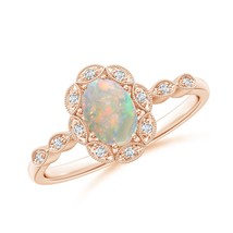 Authenticity Guarantee

ANGARA Natural 0.51 Ct Oval Opal Halo Ring with Milgr... - £575.28 GBP