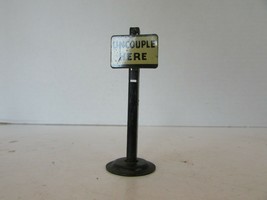 VINTAGE METAL RAILROAD TRACK SIGN UNCOUPLE HERE  2.75&quot;  M41 - £2.90 GBP
