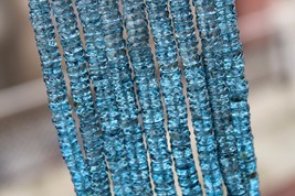 Natural, 8 inch long strand faceted London topaz wheel / tire heishi bea... - $49.99