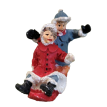 Mini Christmas Village Accessory Figurine 2 People Sledding 1.75&quot; Tall Resin - £3.89 GBP