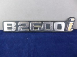1987-1993 Mazda &quot;B2600i&quot; Pickup Truck Emblem OEM UE3851720 - £6.66 GBP