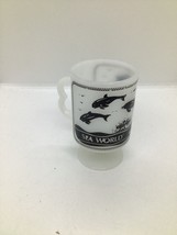 Vintage 1980 Sea World Milk Glass Pedestal Coffee Cup Mug Shamu &amp;  Dolphins - $11.88