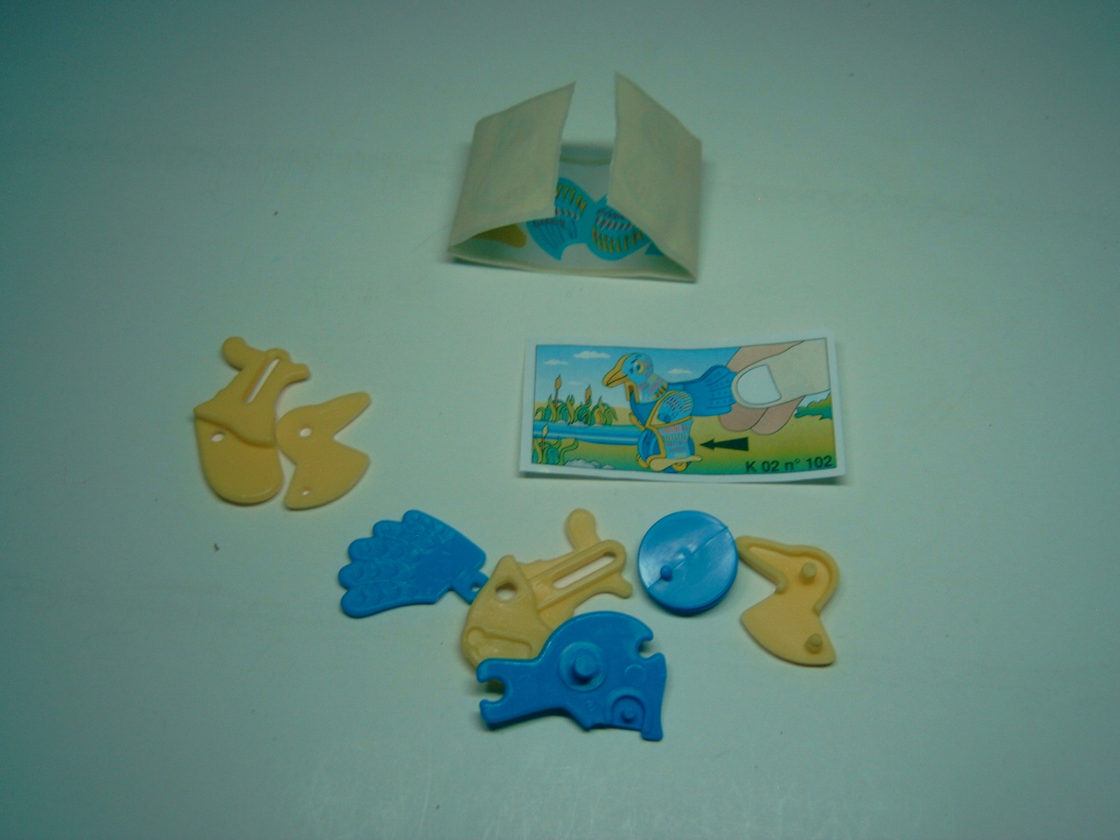 Kinder - K02 102 Running bird + paper + sticker - surprise egg - $1.50