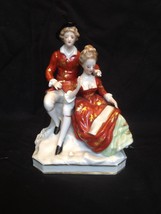 antique porcelain. Lord and Lady in red. Marked with 2 marks - £78.75 GBP