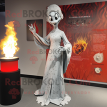 Silver Fire Eater mascot costume character dressed with a Shift Dress and Shawls - $1,199.00