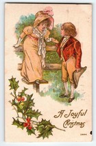Christmas Postcard Victorian Children Outside Holly Leaves 1909 Embossed - £8.17 GBP