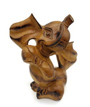 Wooden Sitting Elephant Holding Circus Ball Carved Wood Figurine 6&quot; - £12.39 GBP