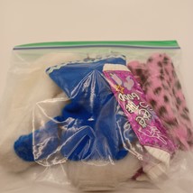 Two Barbie coats, one blue with white hand warmer and a spotted coat - $15.99