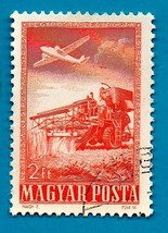 Used Hungary Airmail Stamp (Scott C76) 1950 Plane Flying Over Tractor 2ft - $1.99