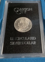 1884 uncirculated Morgan silver dollar - $385.00